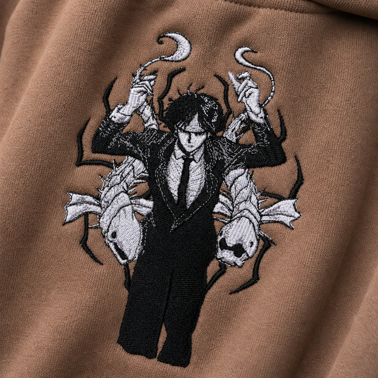Kaito The False Prophet — premium embroidered design close-up, v20260623.