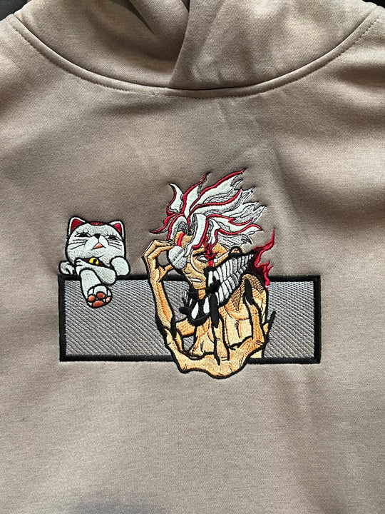 Hoodie brodé Okarun Kaito Global — photo produit avec motif brodé.