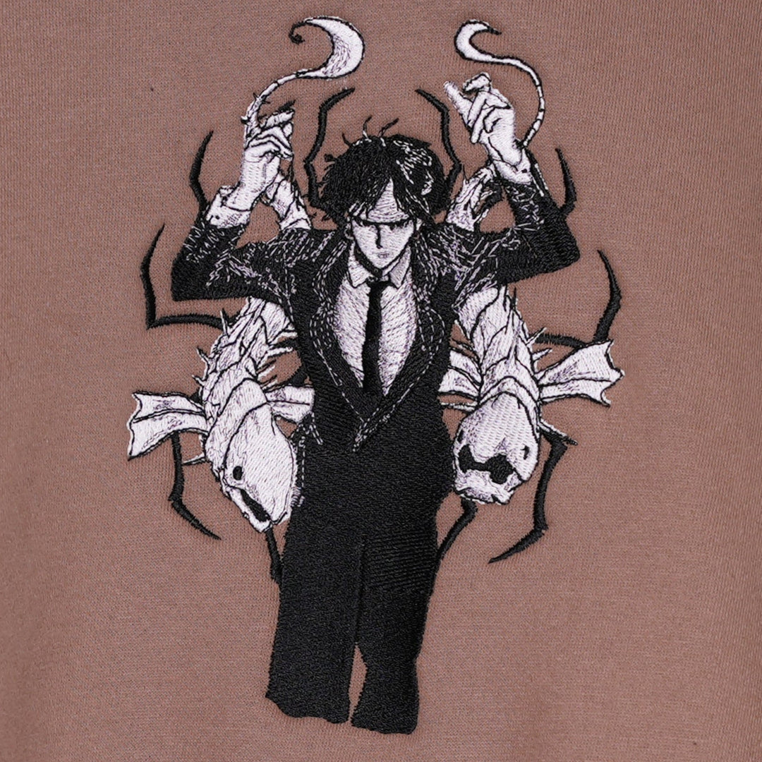 Hoodie brodé The False Prophet Kaito Global — photo produit avec motif brodé.