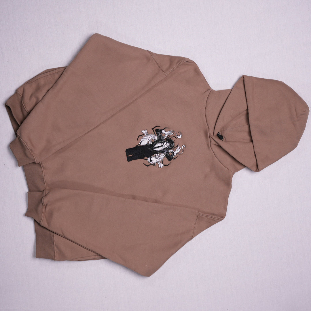 Hoodie brodé The False Prophet Kaito Global — photo produit avec motif brodé.