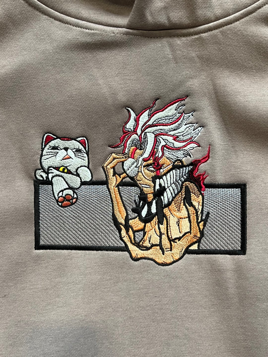 Hoodie brodé Okarun Kaito Global — photo produit avec motif brodé.